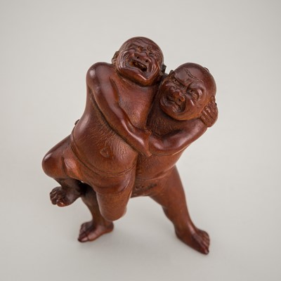 Lot 455 - MASAKAZU: A WOOD OKIMONO NETSUKE OF TWO SUMO WRESTLERS