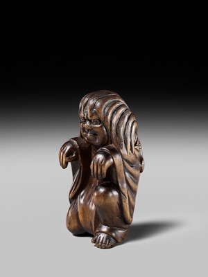 Lot 108 - A VERY RARE WOOD NETSUKE OF DARUMA IMITATING A GHOST