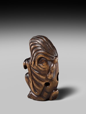 Lot 108 - A VERY RARE WOOD NETSUKE OF DARUMA IMITATING A GHOST