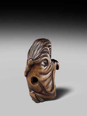 Lot 108 - A VERY RARE WOOD NETSUKE OF DARUMA IMITATING A GHOST