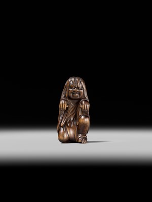 Lot 108 - A VERY RARE WOOD NETSUKE OF DARUMA IMITATING A GHOST