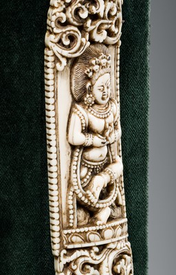 Lot 10 - A BONE PLAQUE FROM A TANTRIC SHANMUDRA (APRON) DEPICTING MAHAKALA, TIBET, 17TH-18TH CENTURY