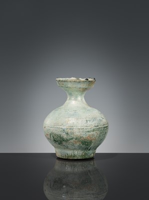 Lot 204 - A GREEN-GLAZED POTTERY JAR, HAN DYNASTY