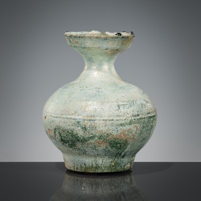 Lot 204 - A GREEN-GLAZED POTTERY JAR, HAN DYNASTY