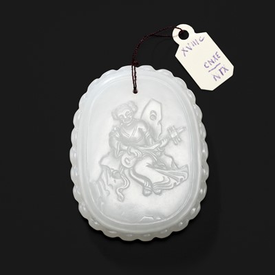 AN INSCRIBED WHITE JADE PLAQUE DEPICTING A LADY PLAYING THE PIPA, 18TH CENTURY