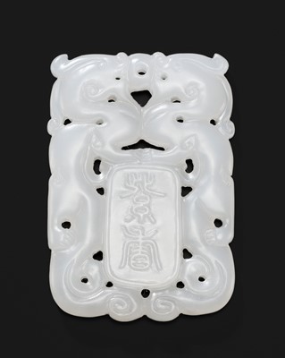 A RETICULATED WHITE JADE ‘CHILONG’ PLAQUE, LATE QING DYNASTY TO REPUBLIC PERIOD