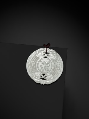 Lot 978 - A WHITE JADE ‘HUANG’ PLAQUE, LATE QING DYNASTY TO REPUBLIC PERIOD