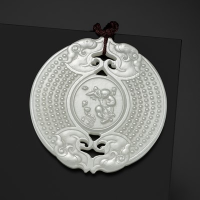 Lot 978 - A WHITE JADE ‘HUANG’ PLAQUE, LATE QING DYNASTY TO REPUBLIC PERIOD