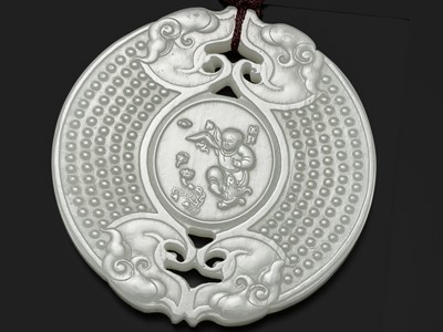 Lot 978 - A WHITE JADE ‘HUANG’ PLAQUE, LATE QING DYNASTY TO REPUBLIC PERIOD