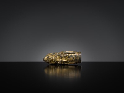 Lot 377 - A GILT BRONZE ‘DRAGON HEAD’ CHARIOT TERMINAL, HAN DYNASTY