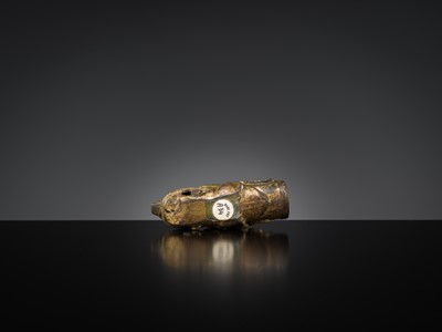 Lot 377 - A GILT BRONZE ‘DRAGON HEAD’ CHARIOT TERMINAL, HAN DYNASTY