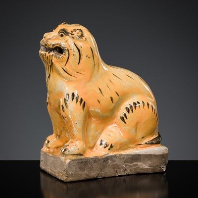 Lot 1748 - A GLAZED PORCELAIN FIGURE OF A TIGER, MING STYLE