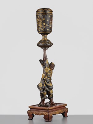 Lot 15 - MIYAO: A LARGE AND IMPRESSIVE PARCEL-GILT BRONZE STATUE OF A WARRIOR HOLDING ALOFT A KORO