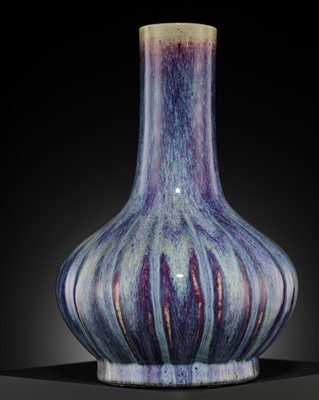 Lot 159 - A FLAMBÉ-GLAZED LOBED BOTTLE VASE, 18TH CENTURY