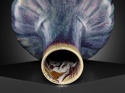 Lot 159 - A FLAMBÉ-GLAZED LOBED BOTTLE VASE, 18TH CENTURY
