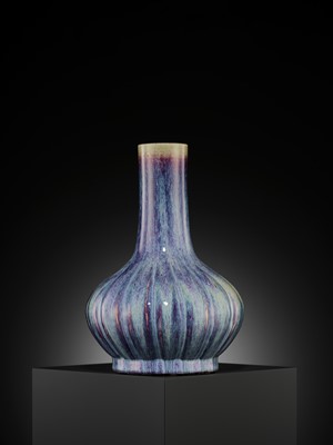 Lot 159 - A FLAMBÉ-GLAZED LOBED BOTTLE VASE, 18TH CENTURY