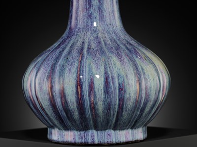 Lot 159 - A FLAMBÉ-GLAZED LOBED BOTTLE VASE, 18TH CENTURY
