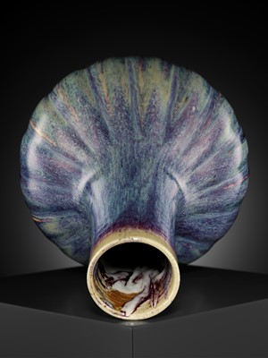 Lot 159 - A FLAMBÉ-GLAZED LOBED BOTTLE VASE, 18TH CENTURY