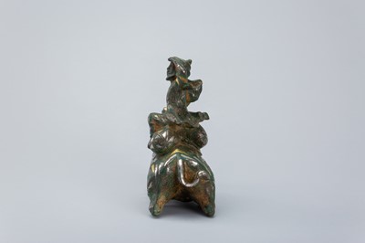 Lot 1568 - AN INLAID BRONZE FIGURE OF A CAMEL WITH RIDER, TANG DYNASTY