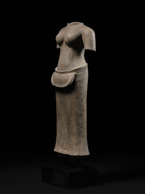 Lot 255 - A LARGE SANDSTONE TORSO OF A FEMALE DEITY, ANGKOR WAT STYLE, ANGKOR PERIOD
