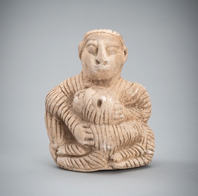 Lot 1347 - A BACTRIAN STONE FIGURE