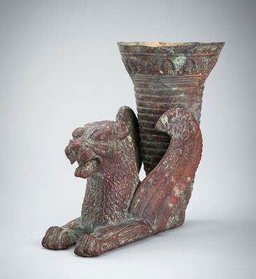 Lot 1010 - A COPPER ACHAEMENID REVIVAL MYTHICAL BEAST RHYTON