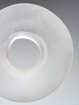 Lot 1685 - A TRANSPARENT GLASS DISC