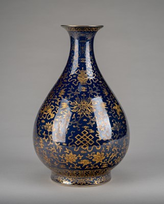 Lot 898 - A GILT-DECORATED POWDER-BLUE GROUND ‘BAJIXIANG AND LOTUS` VASE, QIANLONG MARK AND PERIOD