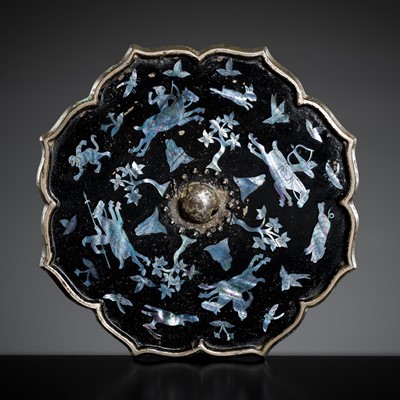 Lot 79 - A LACQUERED AND MOTHER-OF-PEARL-INLAID BRONZE MIRROR, TANG DYNASTY