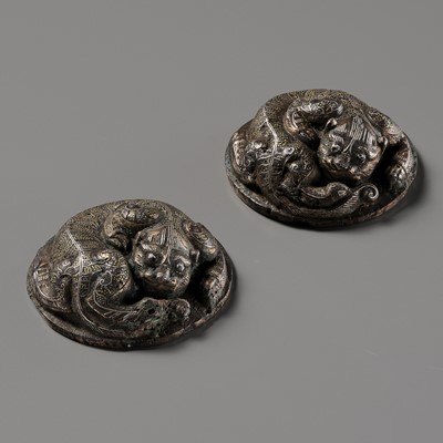 Lot 68 - A PAIR OF GOLD AND SILVER INLAID BRONZE ‘TIGER’ MAT WEIGHTS, HAN DYNASTY