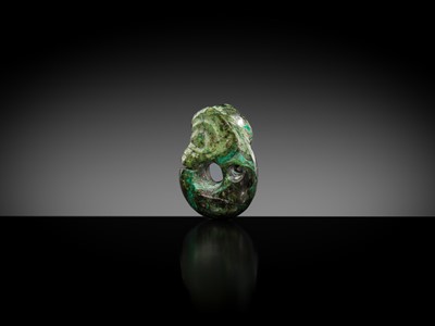 Lot 792 - A TURQUOISE MATRIX ‘PIG-DRAGON’ PENDANT, ZHULONG, HONGSHAN CULTURE