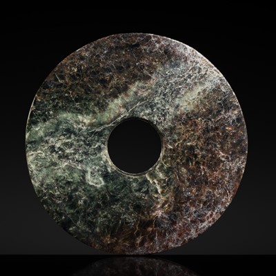 Lot 149 - A MOTTLED JADE BI DISC, LIANGZHU CULTURE