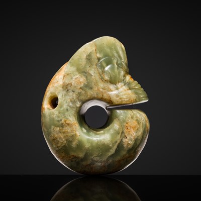 Lot 137 - A CELADON AND RUSSET JADE ‘PIG DRAGON’, ZHULONG, HONGSHAN CULTURE