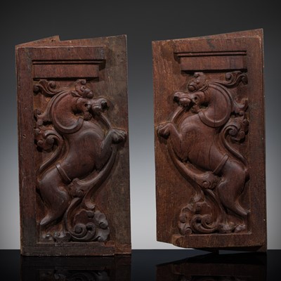 Lot 636 - A PAIR OF CARVED WOOD ‘YALI’ PANELS, INDIA, 18TH-19TH CENTURY