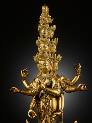 Lot 23 - A GILT BRONZE FIGURE OF THE ELEVEN-HEADED AVALOKITESHVARA, 17TH-18TH CENTURY