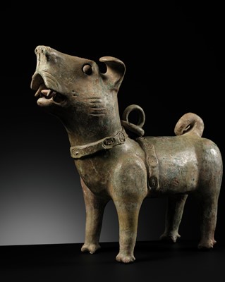 Lot 517 - A LARGE AND IMPRESSIVE GREEN-GLAZED POTTERY FIGURE OF A DOG, HAN DYNASTY