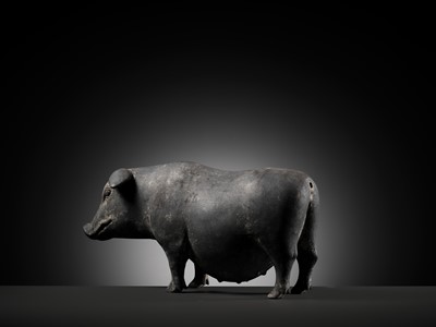 Lot 127 - A BLACK PAINTED POTTERY FIGURE OF A PREGNANT SOW, HAN DYNASTY