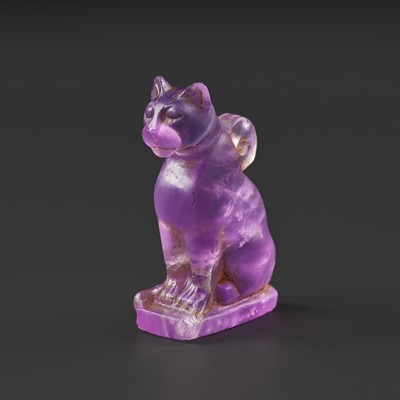 Lot 39 - A MASTERFULLY CARVED AMETHYST ‘CAT’ AMULET, BASTET, LATE PERIOD TO PTOLEMAIC ERA