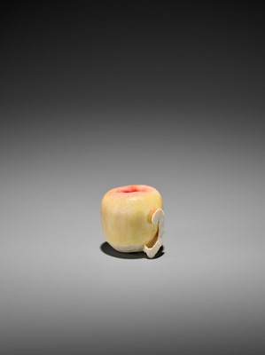 Lot 109 - A STAINED IVORY ‘TROMPE L’OEIL’ OKIMONO OF AN APPLE
