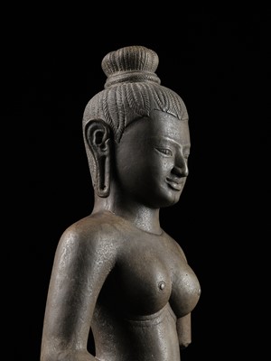 Lot 261 - A LARGE SANDSTONE FIGURE OF UMA, MEKONG DELTA, LATE 12TH CENTURY