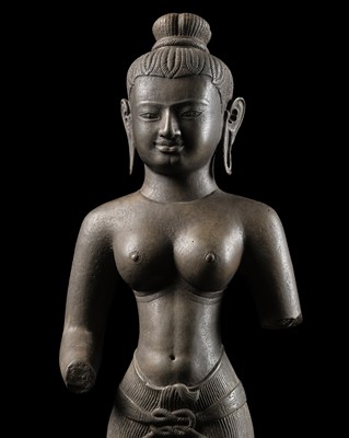 Lot 261 - A LARGE SANDSTONE FIGURE OF UMA, MEKONG DELTA, LATE 12TH CENTURY