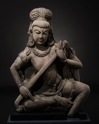 Lot 327 - AN IMPORTANT BUFF SANDSTONE FIGURE OF SHIVA VINADHARA, LATER GUPTA