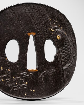 Lot 88 - YOSHIHISA: A FINE IRON TSUBA DEPICTING A DRAGON CARP