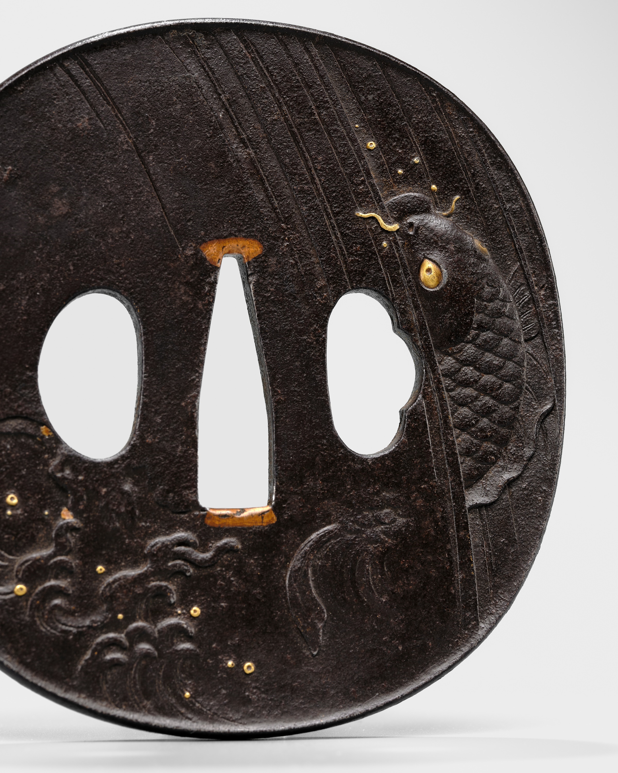 Lot 88 - YOSHIHISA: A FINE IRON TSUBA DEPICTING A