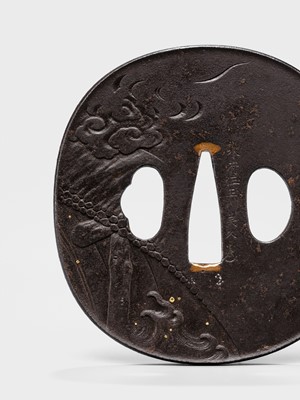 Lot 88 - YOSHIHISA: A FINE IRON TSUBA DEPICTING A DRAGON CARP
