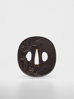 Lot 88 - YOSHIHISA: A FINE IRON TSUBA DEPICTING A DRAGON CARP