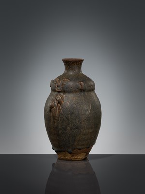 Lot 355 - A BROWN-GLAZED HUMANOID STONEWARE JAR, ANGKOR PERIOD