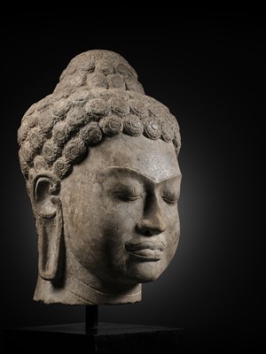 Lot 252 - A RARE AND LARGE SANDSTONE HEAD OF BUDDHA, MON DVARAVATI