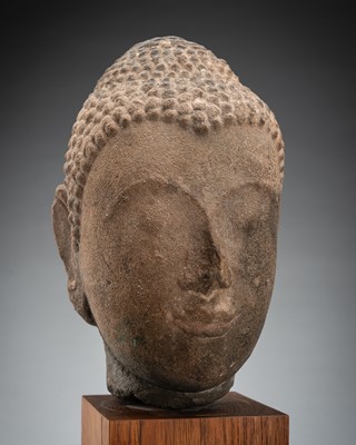 Lot 1015 - A SANDSTONE HEAD OF BUDDHA, AYUTTHAYA KINGDOM