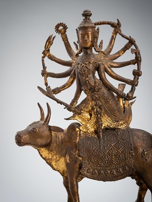 A RATTANAKOSIN GILT BRONZE FIGURE OF SHIVA ON THE BULL NANDI, 19TH CENTURY